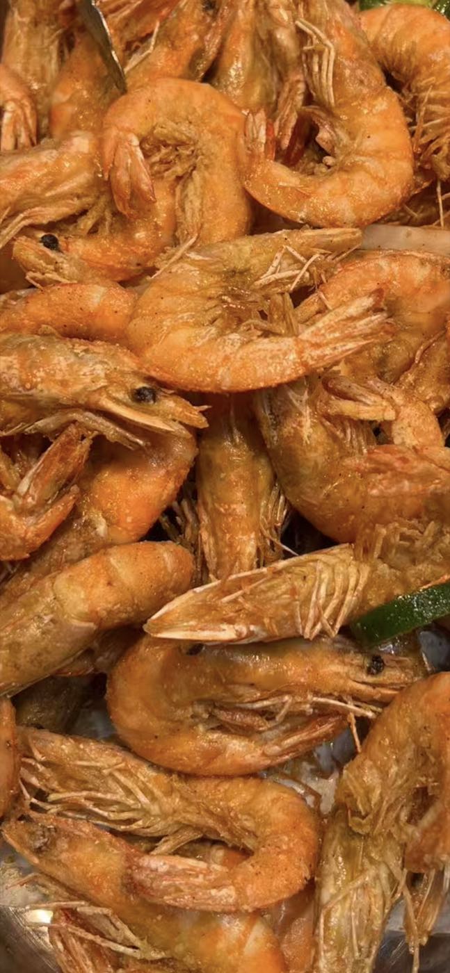 Seasoned fried shrimp piled high on the seafood bar